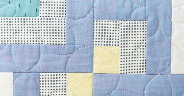 Using Your Embroidery Machine for Quilt Labels