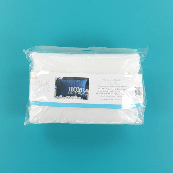 Packaged Kimberbell Pillow Insert 12x18 on a teal background