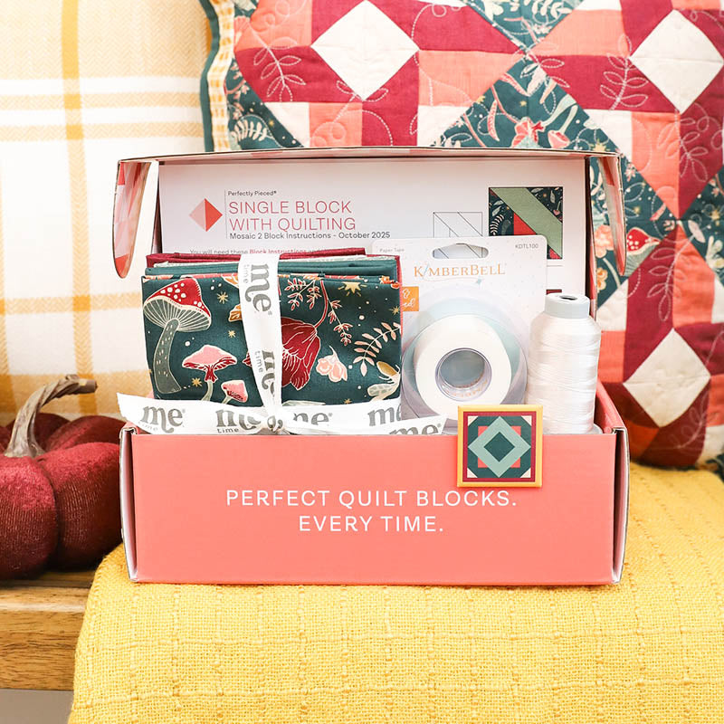 October 2025 Perfectly Pieced box displaying fabrics, fabric tape, and thread.