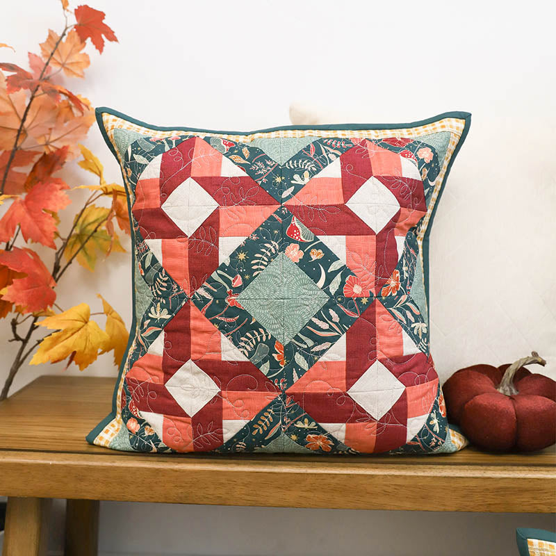 Quilted pillow with Perfectly Pieced design for October of 2025
