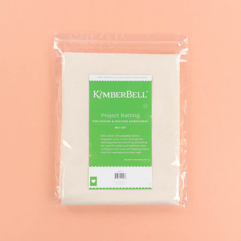 Kimberbell Project Batting packaging on a peach background