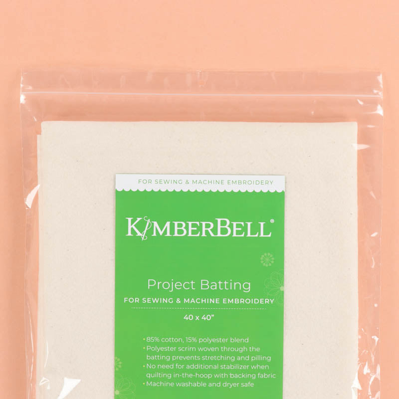 Packaged Kimberbell Project Batting on a peach background