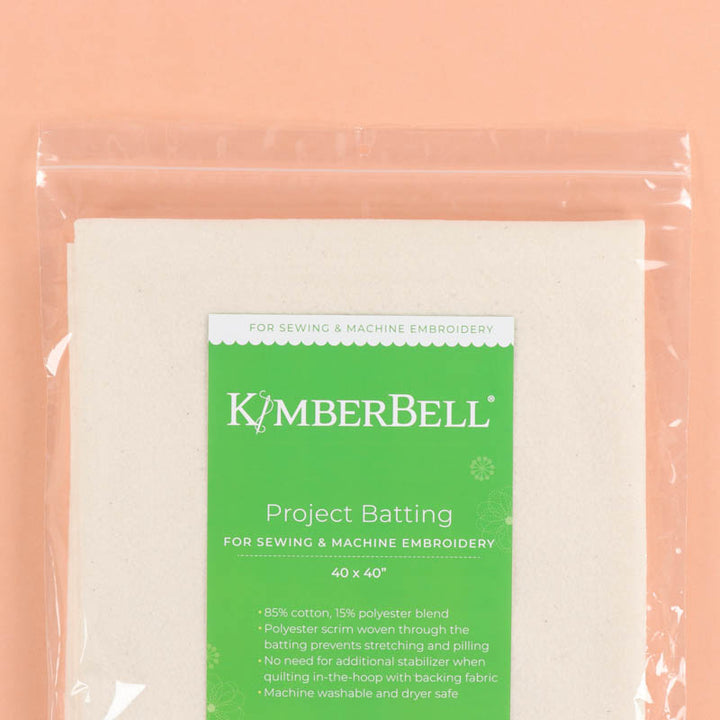 Packaged Kimberbell Project Batting on a peach background