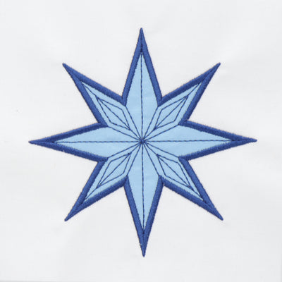 Blue snowflake applique on a white background